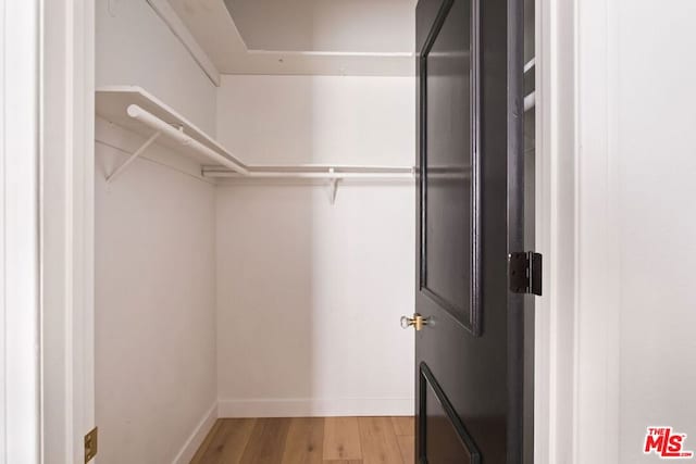 walk in closet featuring light wood-type flooring