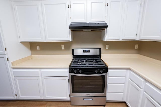 kitchen with white cabinetry and stainless steel gas stove