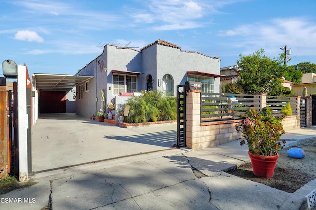 view of front facade with a carport