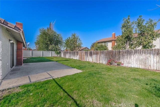 view of yard with a patio area