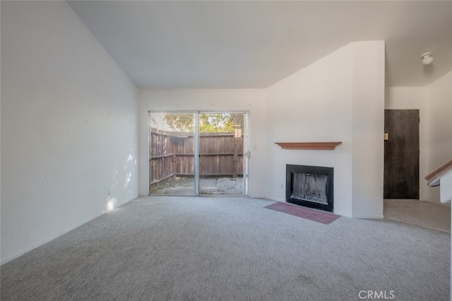 unfurnished living room with carpet floors