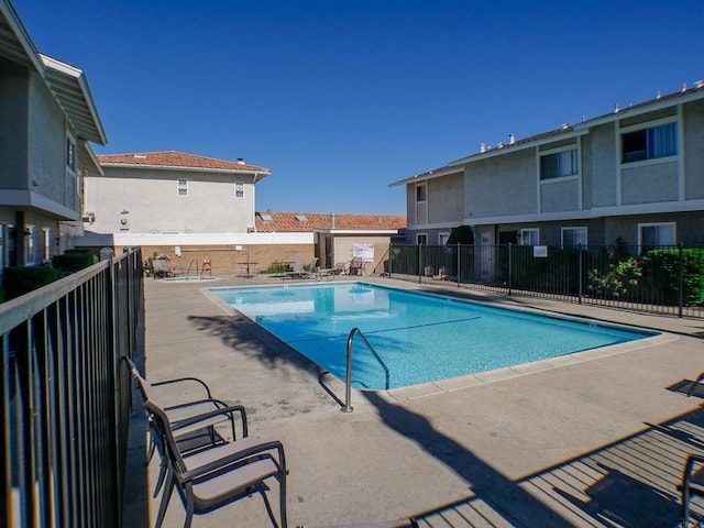 view of pool featuring a patio