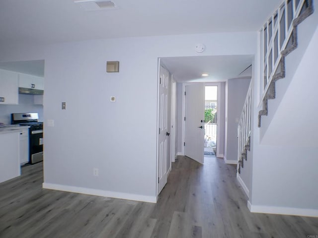 foyer entrance with light hardwood / wood-style flooring