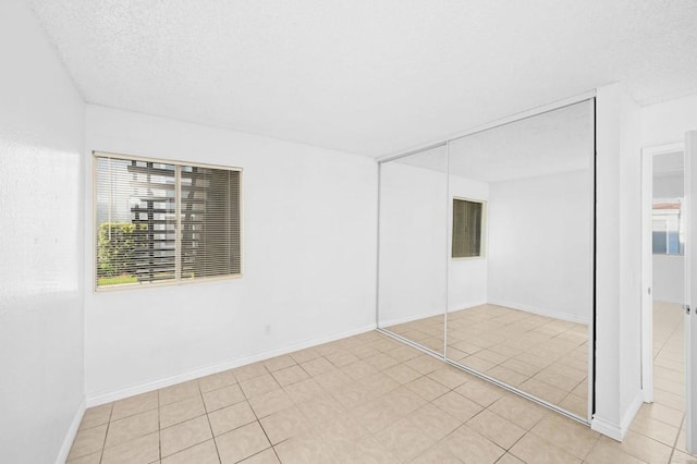 interior space featuring light tile patterned flooring