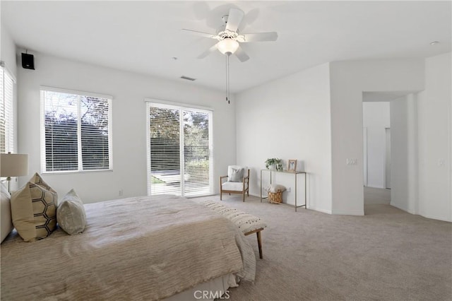 unfurnished bedroom with ceiling fan and light carpet