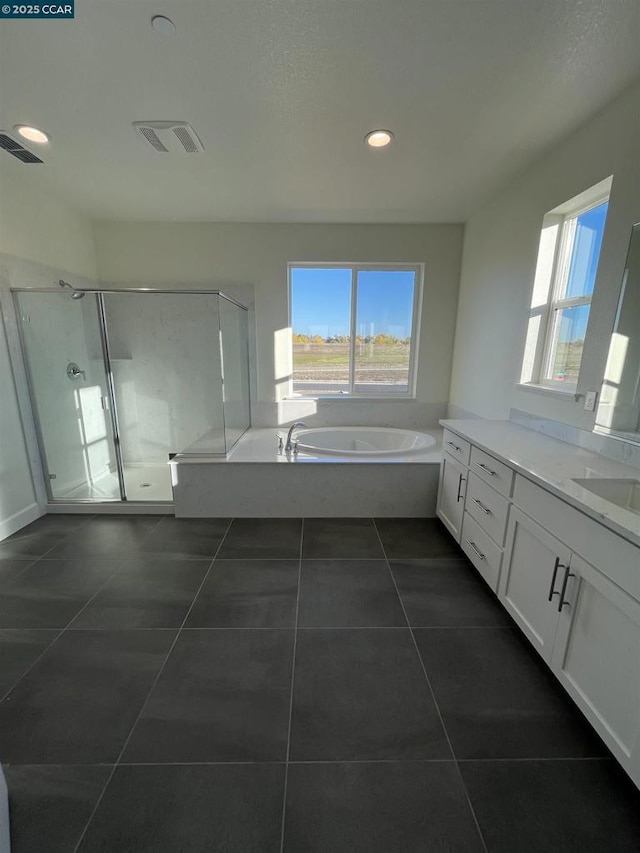 bathroom with vanity, tile patterned flooring, and independent shower and bath