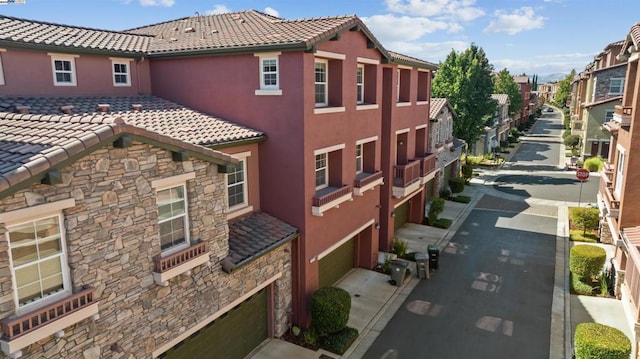 view of property exterior featuring a garage