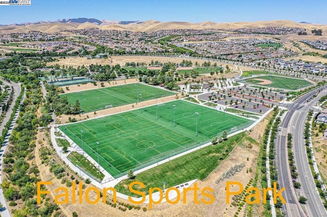 drone / aerial view featuring a mountain view