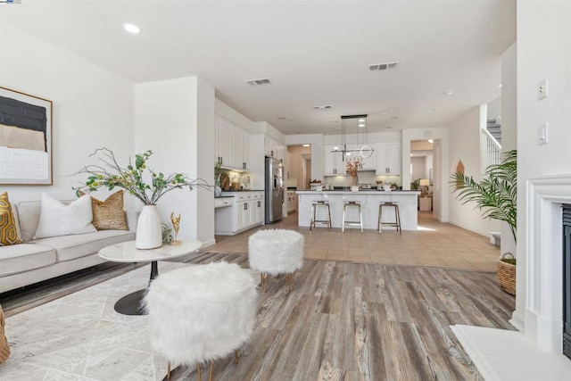 living room featuring light wood-type flooring