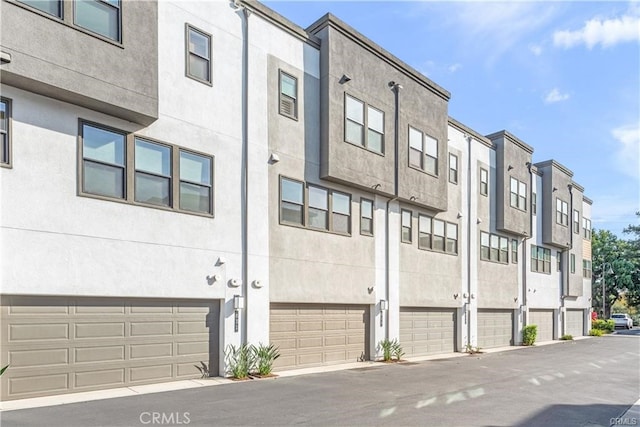 view of property featuring a garage