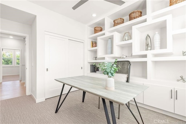 home office with light colored carpet