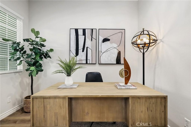 office space with dark wood-type flooring