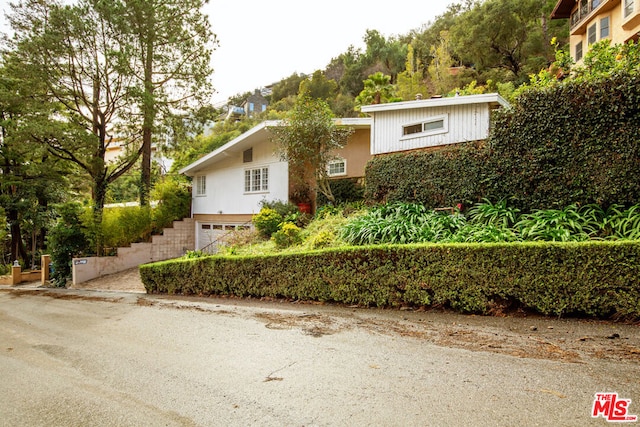 view of front of home with a garage