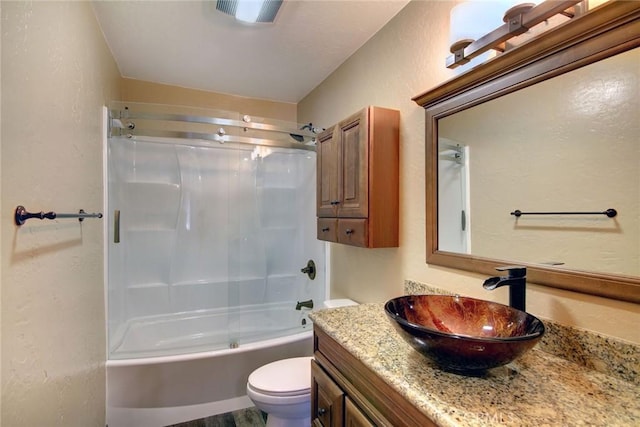 full bathroom featuring toilet, vanity, hardwood / wood-style floors, and shower / bathtub combination