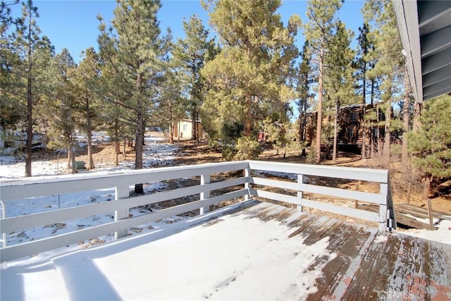 view of snow covered deck