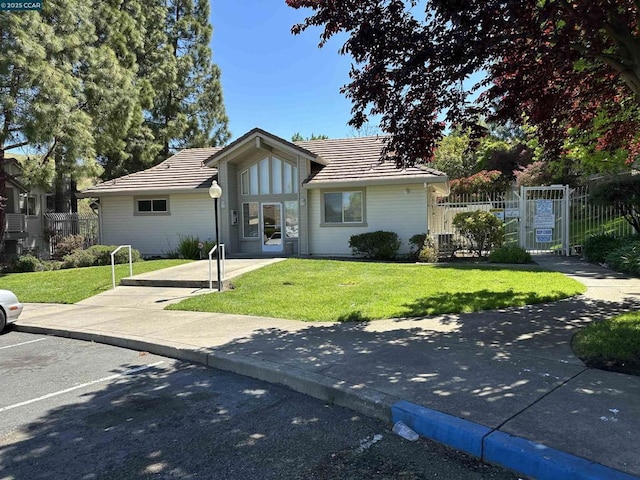 view of front of home with a front yard