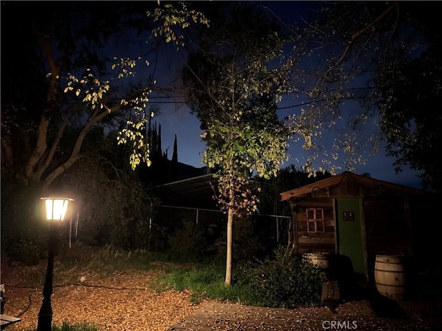 view of property exterior at twilight