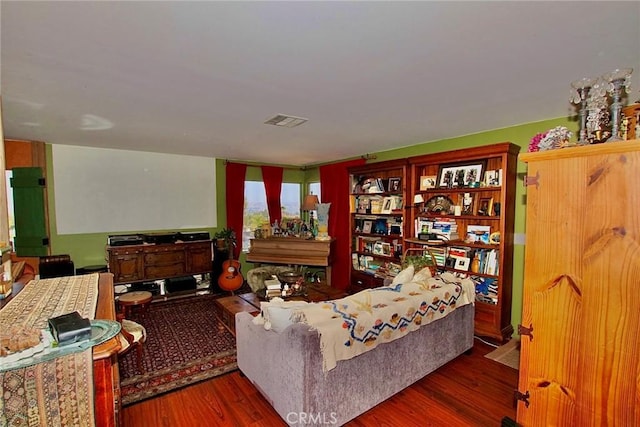 living room featuring dark wood-type flooring