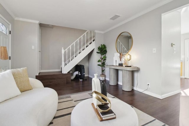 living room with ornamental molding and dark wood-type flooring