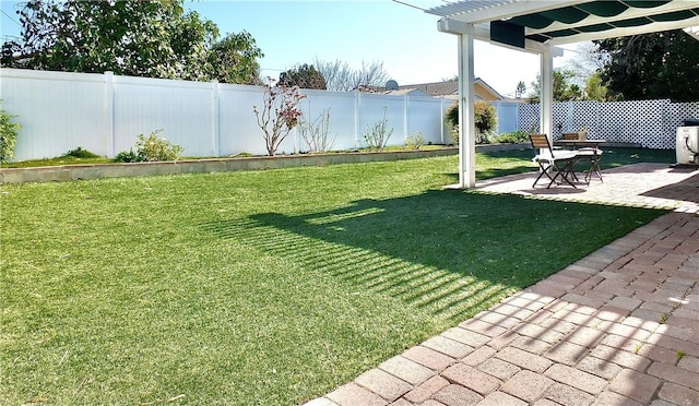 view of yard featuring a pergola and a patio