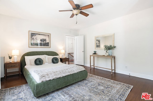 bedroom featuring ceiling fan and hardwood / wood-style flooring