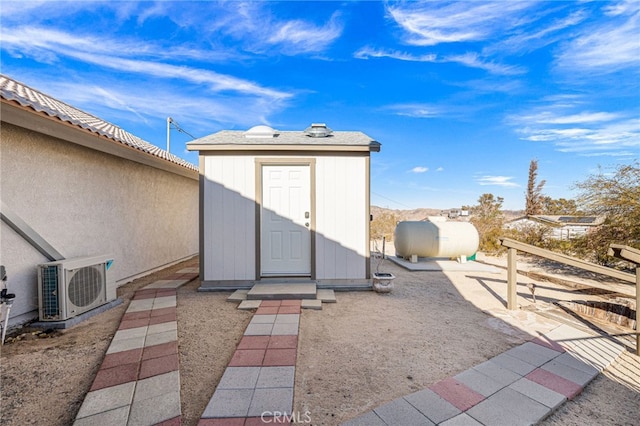 view of outdoor structure with ac unit