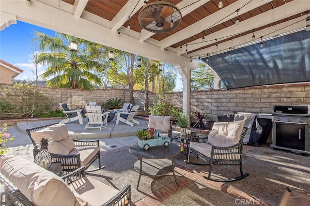 view of patio / terrace featuring ceiling fan, outdoor lounge area, a fenced backyard, and area for grilling