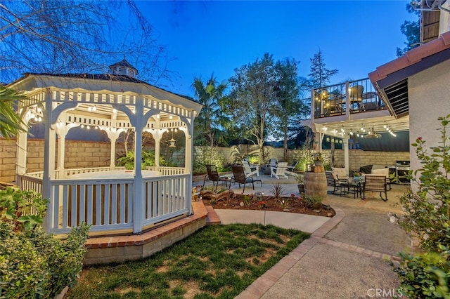 view of yard with a fenced backyard, a patio, and a gazebo