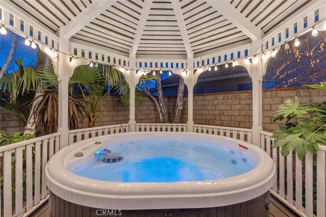 view of pool featuring a hot tub