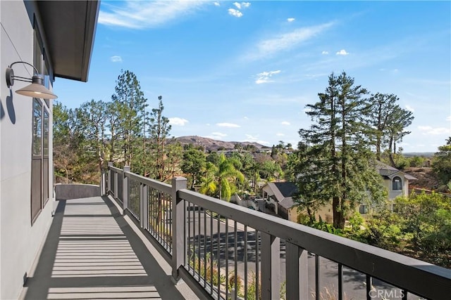 balcony featuring a mountain view