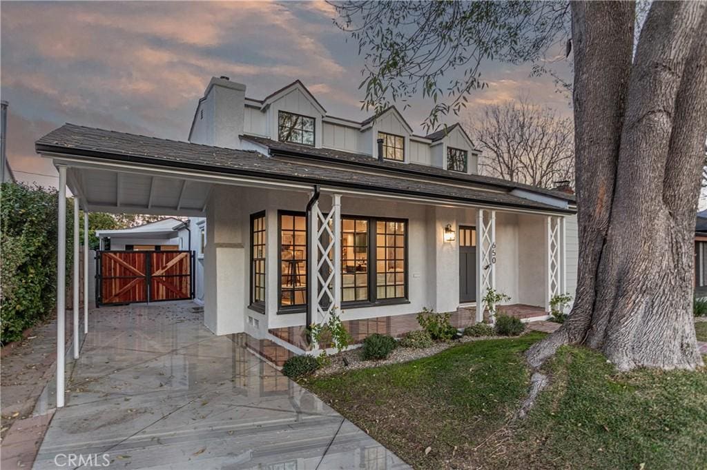 view of front of house featuring a carport