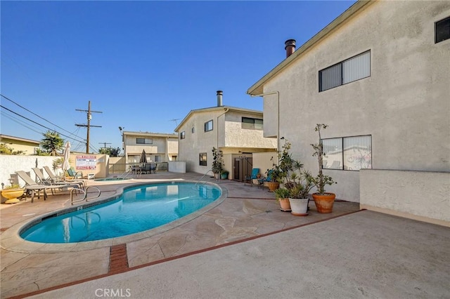 view of pool with a patio