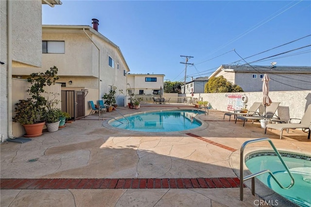 view of pool with a patio