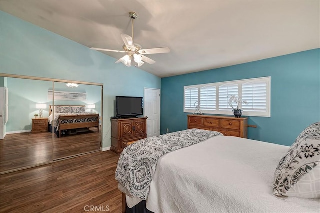 bedroom featuring lofted ceiling, dark wood-type flooring, and ceiling fan