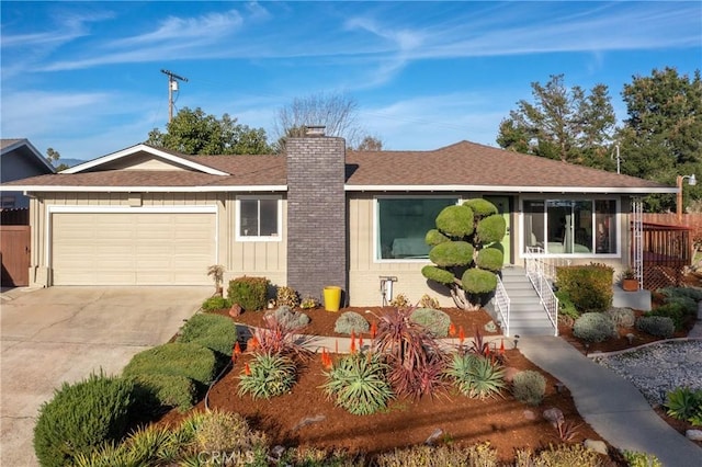 ranch-style house featuring a garage