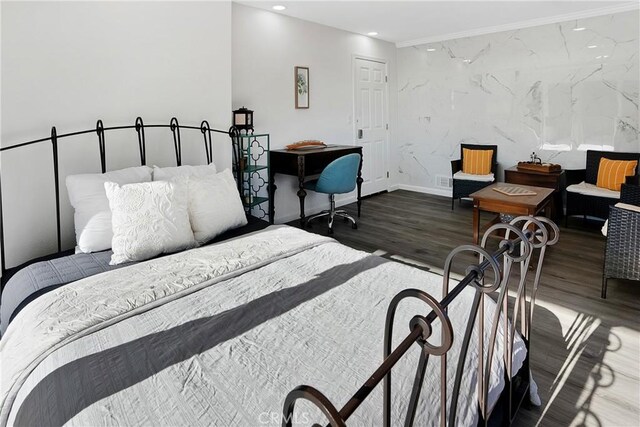 bedroom featuring dark hardwood / wood-style flooring