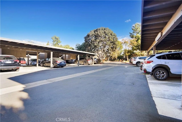 view of car parking featuring a carport