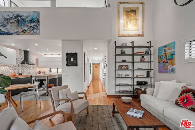 living room with light hardwood / wood-style floors