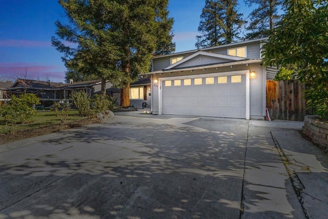 front of property with a garage