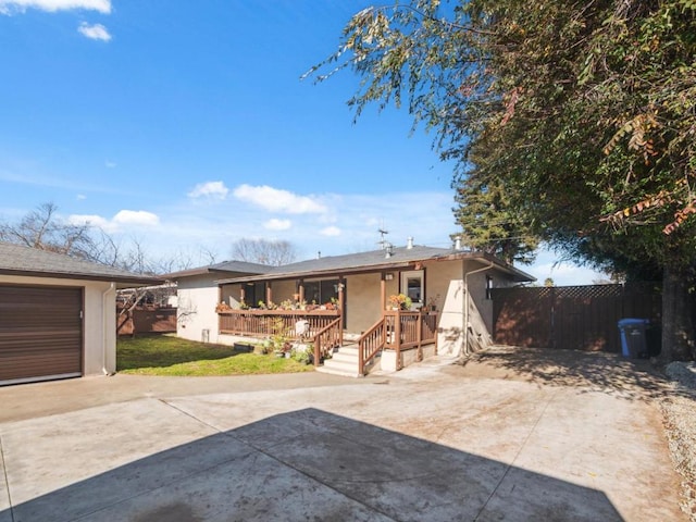 view of front of property with a garage and a porch