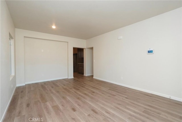 empty room featuring light hardwood / wood-style flooring