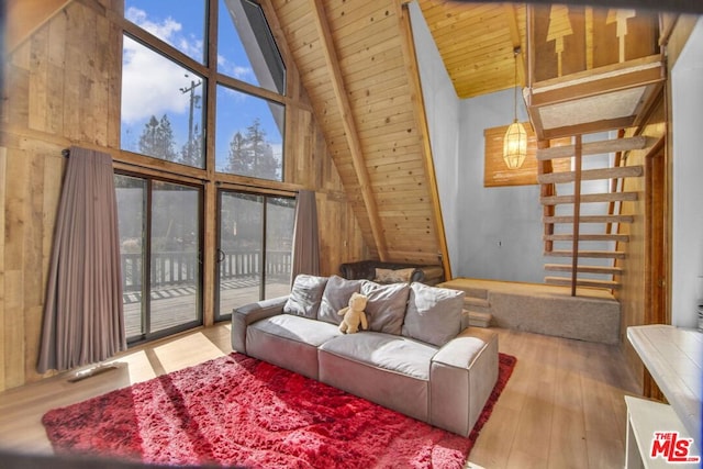 living room with beam ceiling, wooden ceiling, high vaulted ceiling, and hardwood / wood-style flooring