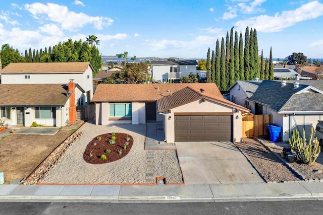 ranch-style house featuring a garage