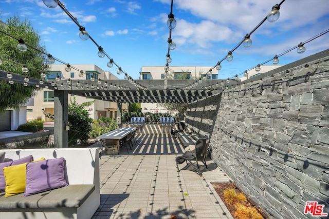 view of patio / terrace featuring a pergola