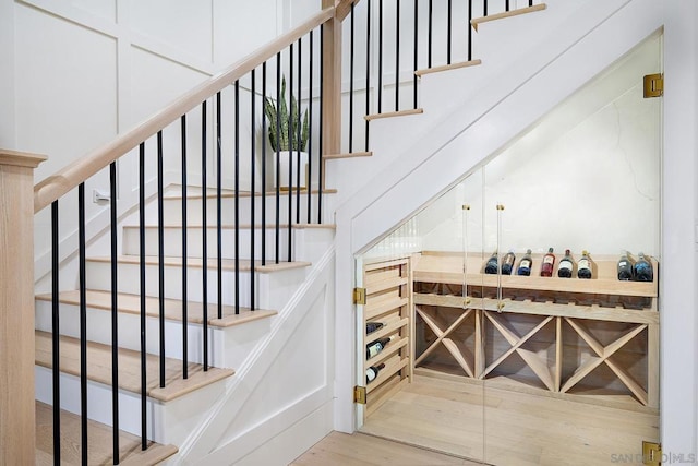 wine room featuring hardwood / wood-style floors