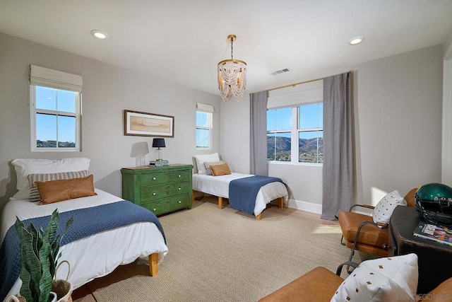 bedroom with a chandelier