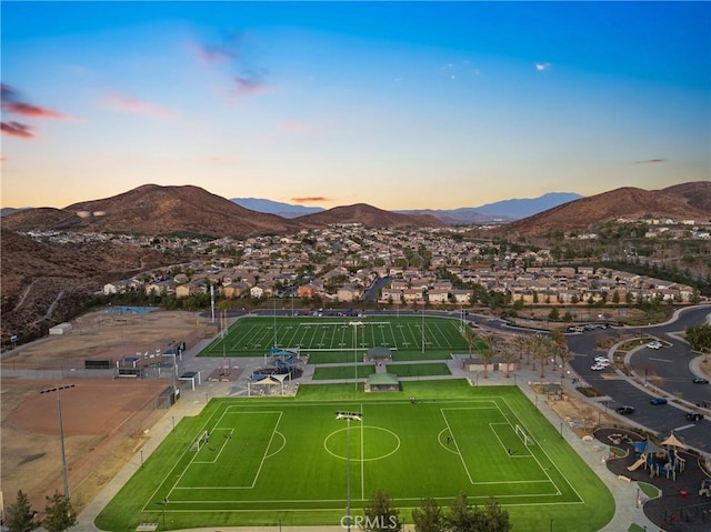 aerial view at dusk with a mountain view