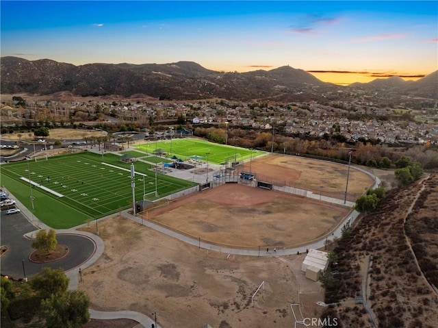 aerial view at dusk with a mountain view