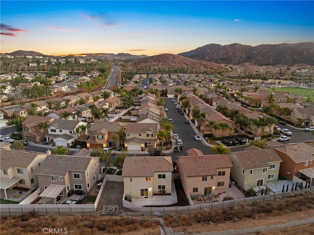 aerial view at dusk with a mountain view