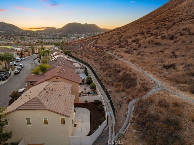 aerial view at dusk with a mountain view